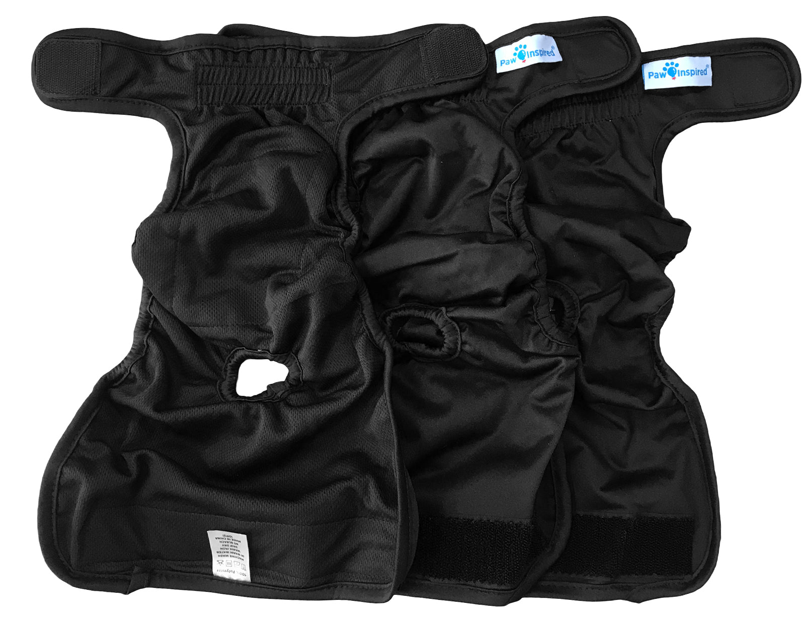 Top view of three opened black washable dog diapers laid flat to show interior design and tail hole.