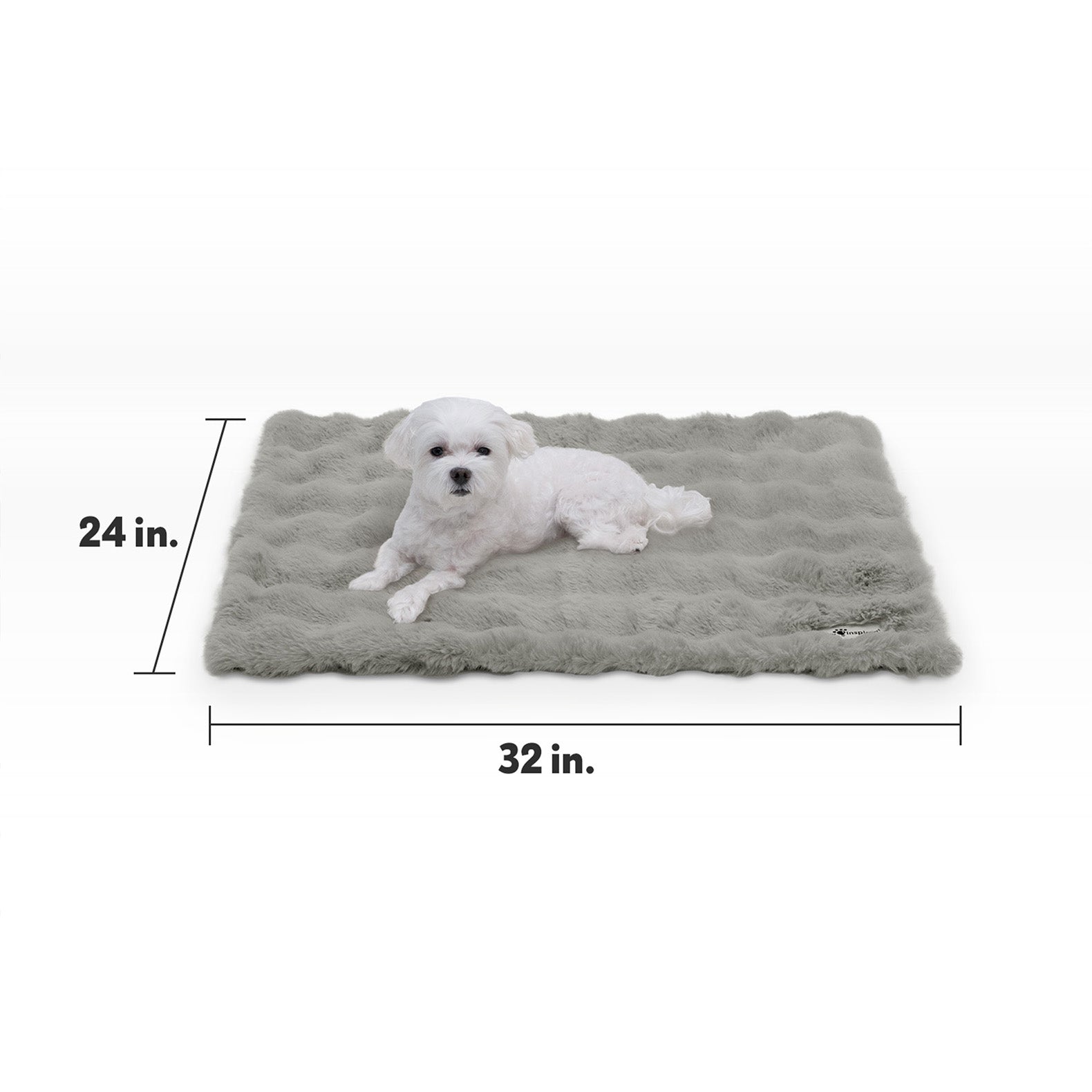 Size guide for Paw Inspired Waterproof Pet Blanket measuring 32 inches by 24 inches with a small white dog for scale.