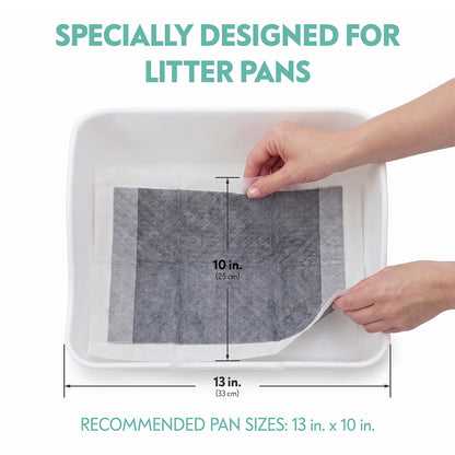 A person fitting the charcoal pad into a litter pan, highlighting it is specially designed for small animal litter pans with a recommended pan size of 13 inches wide by 10 inches deep.